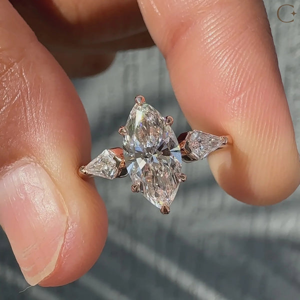 1.0 CTW Marquise Three Stone Style Lab Grown Diamond Engagement Ring - 069a0263e6c847a384a72ad97fd7876d.thumbnail.0000000000