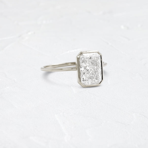 Solitaire Bezel with Hidden Stone-Radiant Lab Grown Diamond Engagement Ring - Solitaire-Oval Lab Grown Diamond Engagement Ring