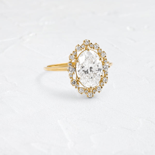 Graduated Halo-Oval Lab Grown Diamond Engagement Ring - Solitaire-Oval Lab Grown Diamond Engagement Ring