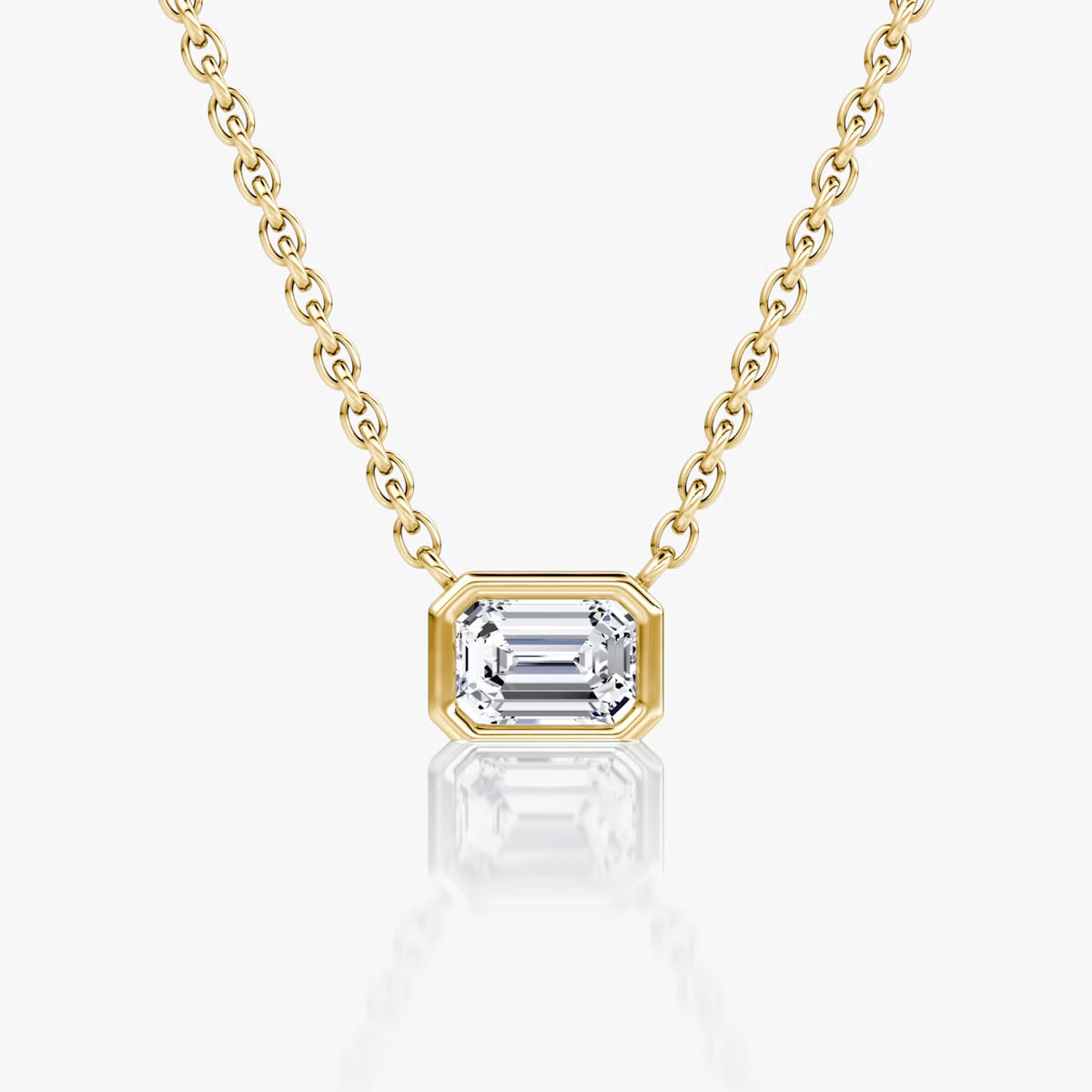 East West Solitaire Bezel- 0.25 CT Emerald Moissanite Necklace
