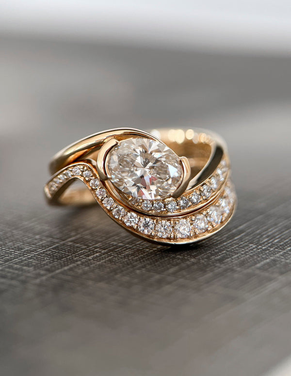 Solitaire Half Bezel Rapture & Pave Band- 1 CT Oval Lab Grown Diamond Bridal Set - Solitaire Rapture & Pave Band- Oval Lab Grown Diamond Bridal Set