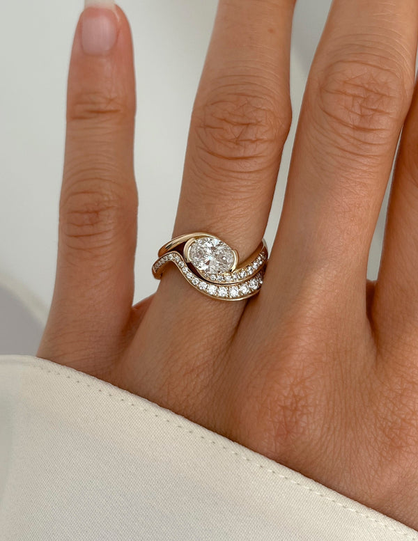Solitaire Half Bezel Rapture & Pave Band- 1 CT Oval Lab Grown Diamond Bridal Set - Solitaire Rapture & Pave Band- Oval Lab Grown Diamond Bridal Set