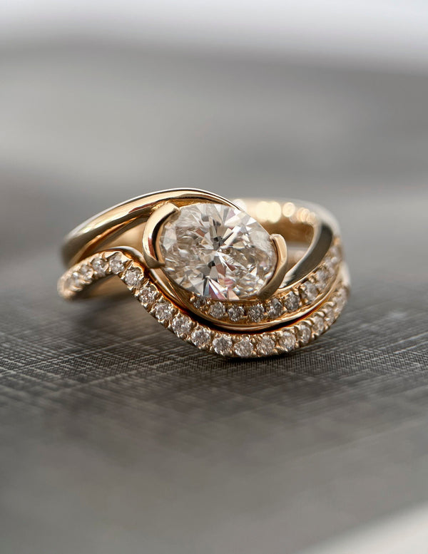 Solitaire Half Bezel Rapture & Pave Band- 1 CT Oval Lab Grown Diamond Bridal Set - Solitaire Rapture & Pave Band- Oval Lab Grown Diamond Bridal Set
