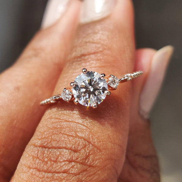 0.80 CT Round Three Stone & Dainty Style Lab Grown Diamond Engagement Ring - FRONT a466151f ebba 4140 a0b8 7102f3d4a047