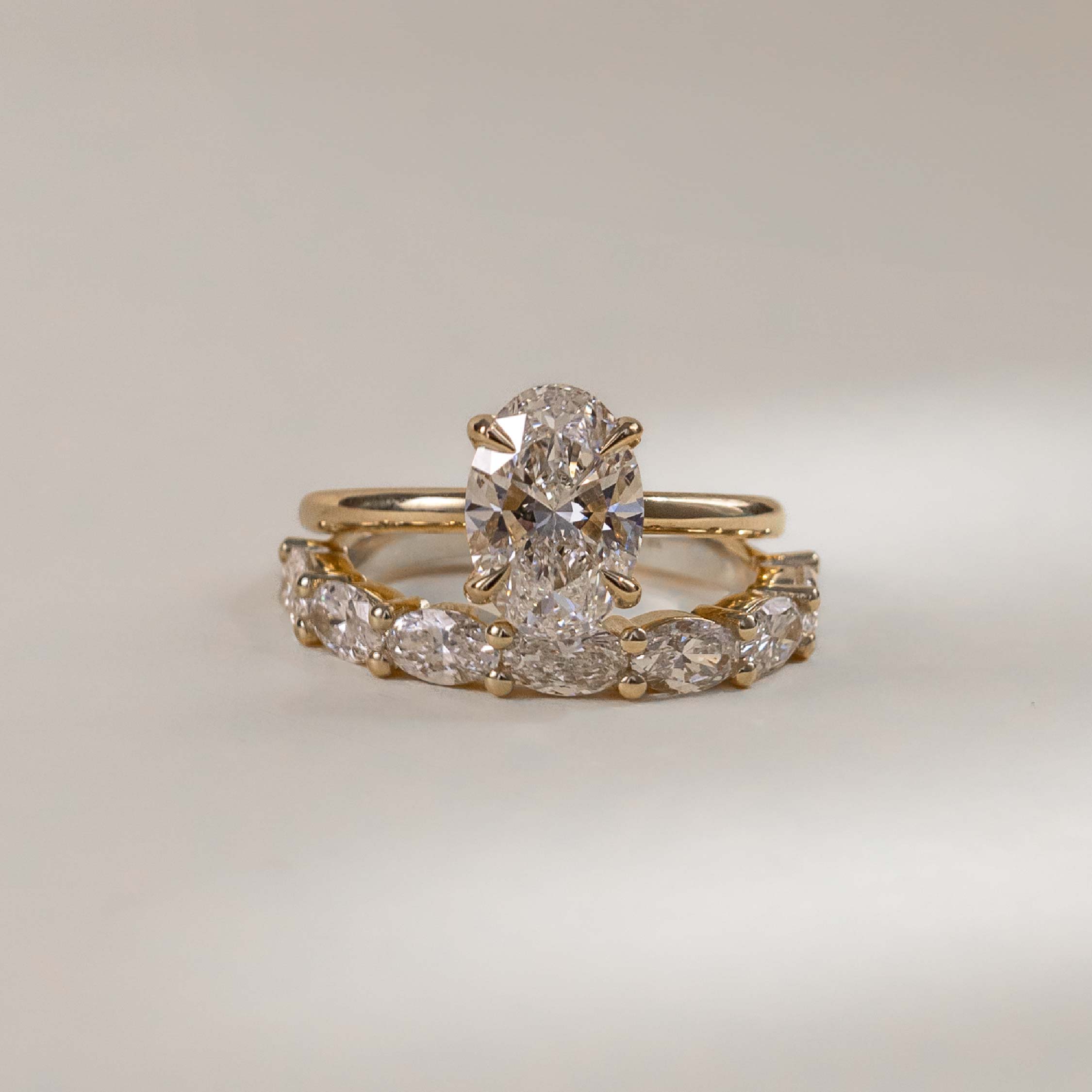Half Eternity- 0.20 CT Oval Moissanite Wedding Band