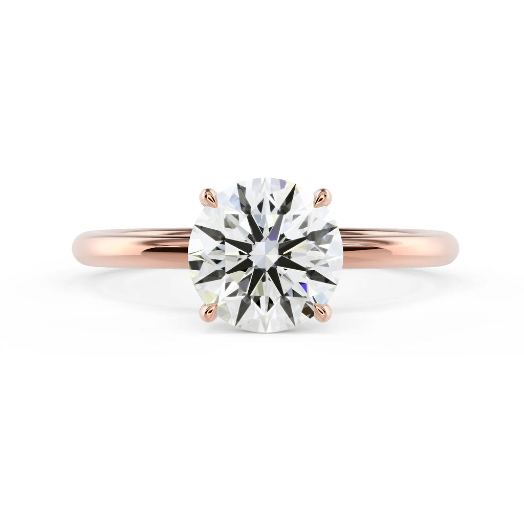 Round Petite Four Prong Solitaire