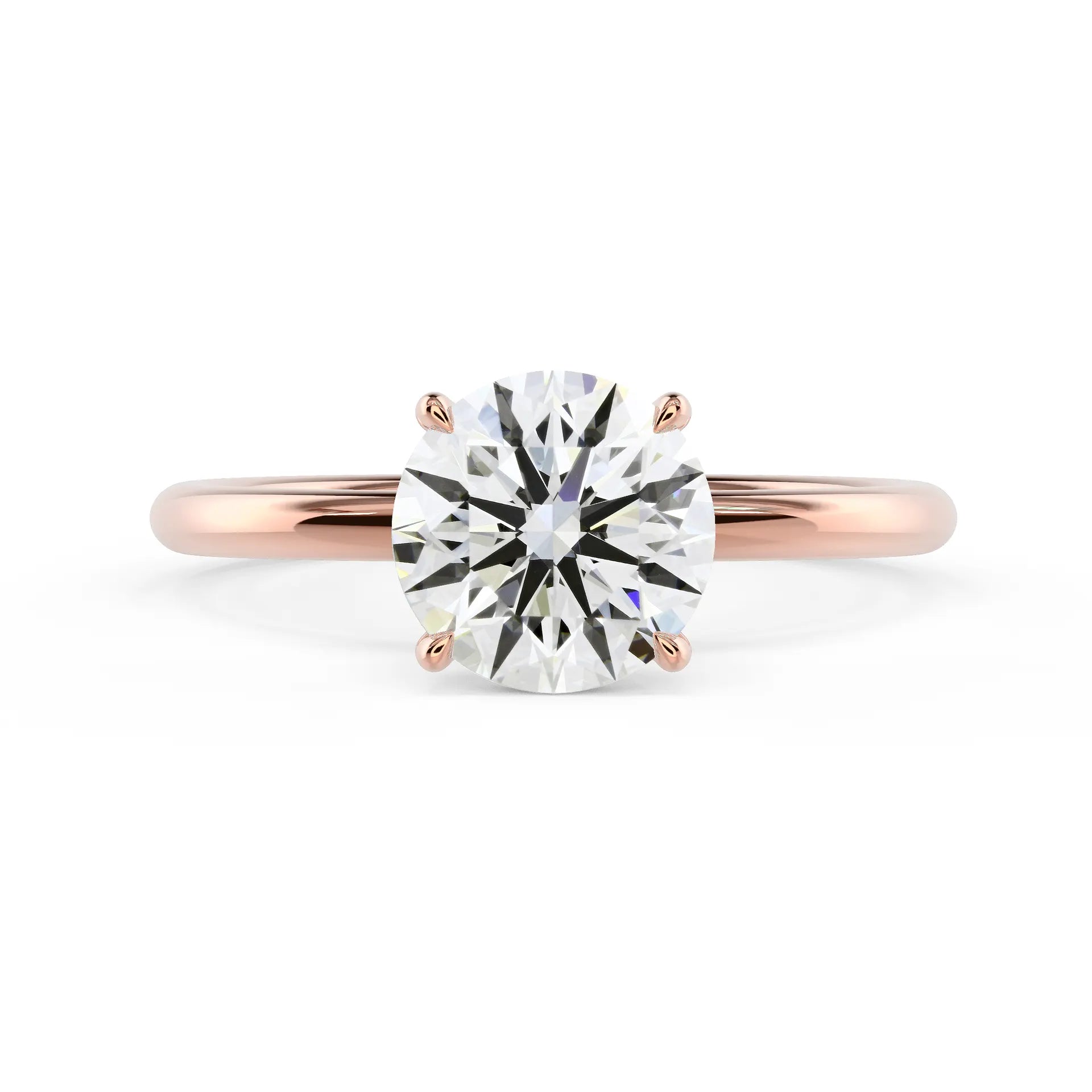 Round Petite Four Prong Solitaire