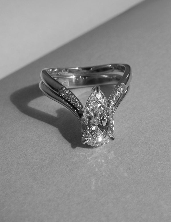 Solitaire Rapture & Plain Band- 2 CT Pear Lab Grown Diamond Bridal Set - Solitaire Rapture & Pave Band- Oval Lab Grown Diamond Bridal Set