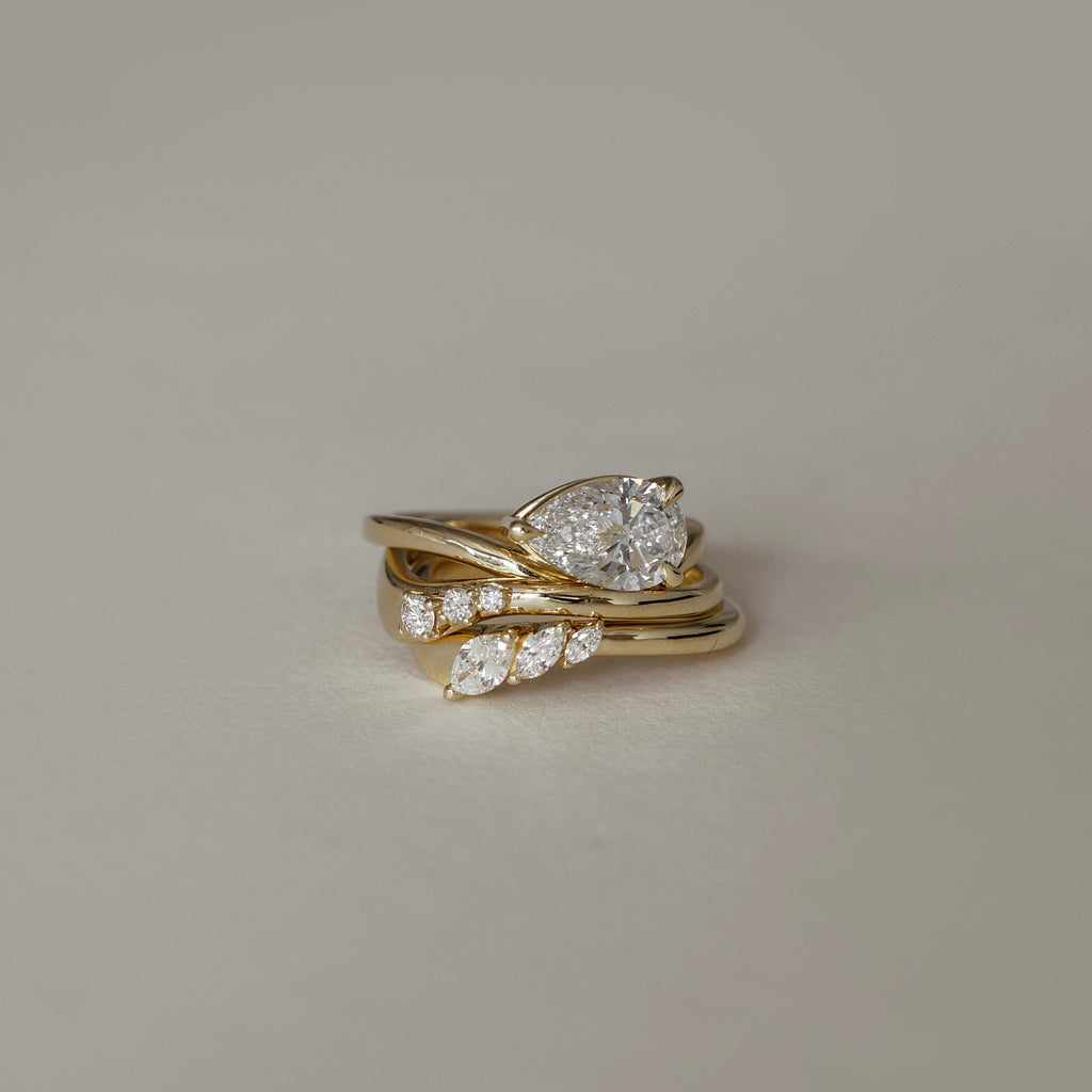 Half Eternity- 0.20 CT Oval Moissanite Wedding Band