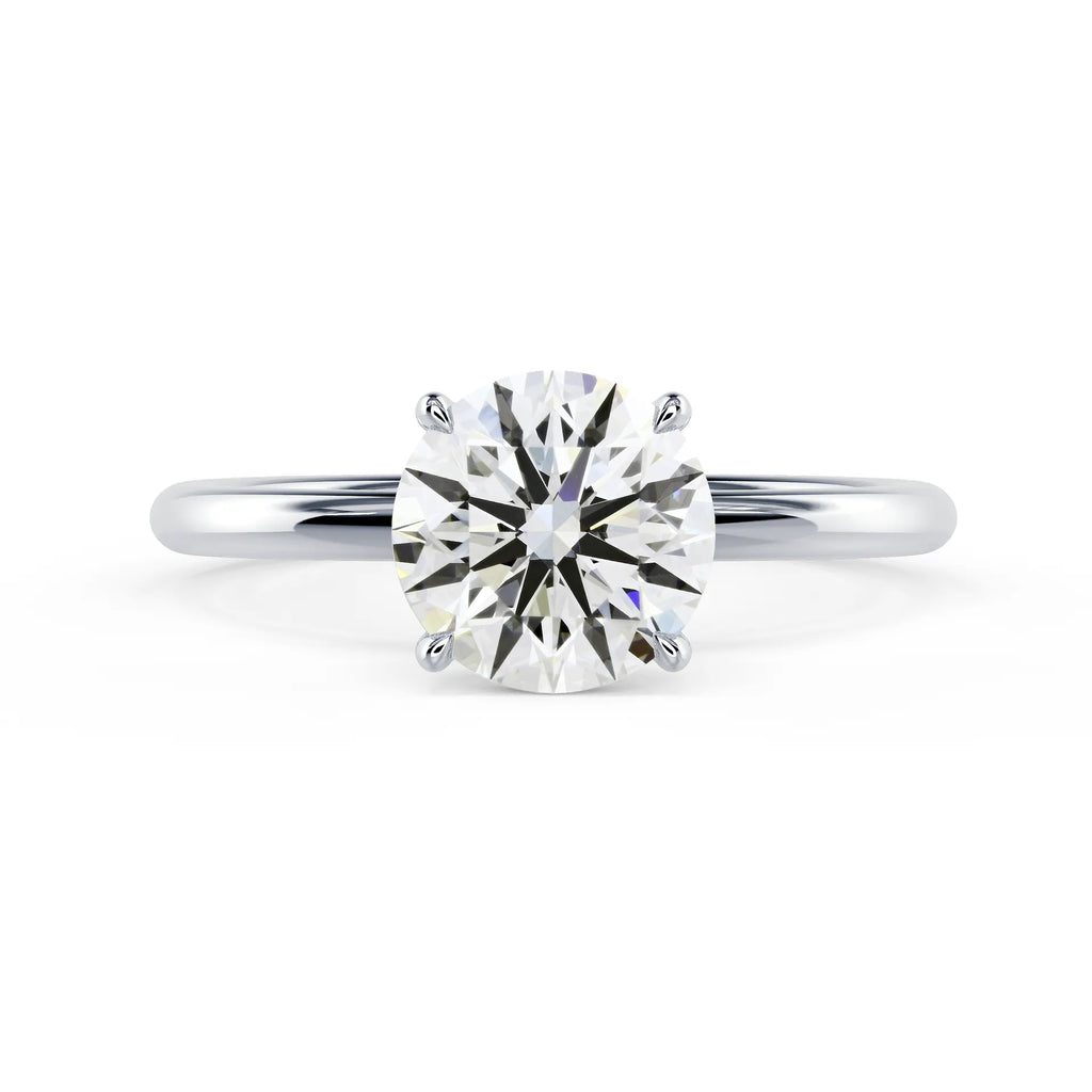 Round Petite Four Prong Solitaire