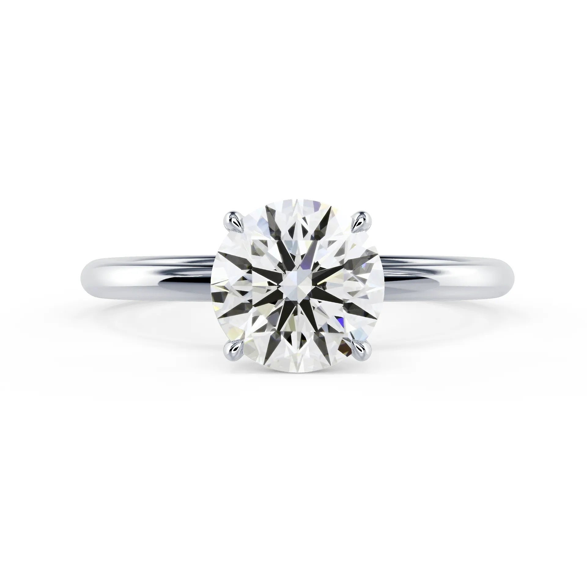Round Petite Four Prong Solitaire