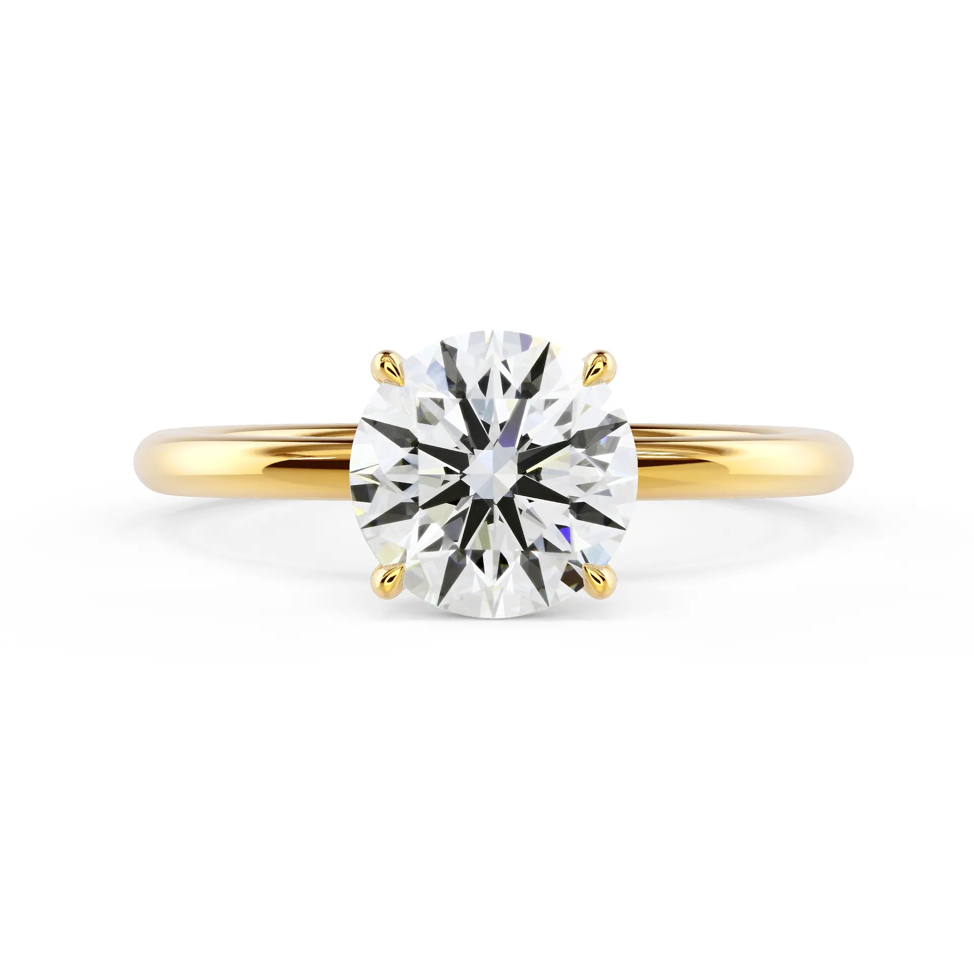 Round Petite Four Prong Solitaire