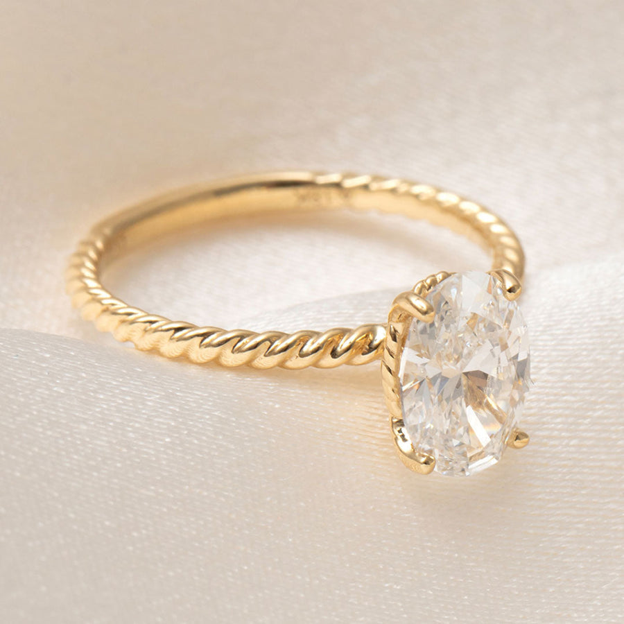 Solitaire & Twisted Shank-1.5 CT Oval Lab Grown Diamond Engagement Ring