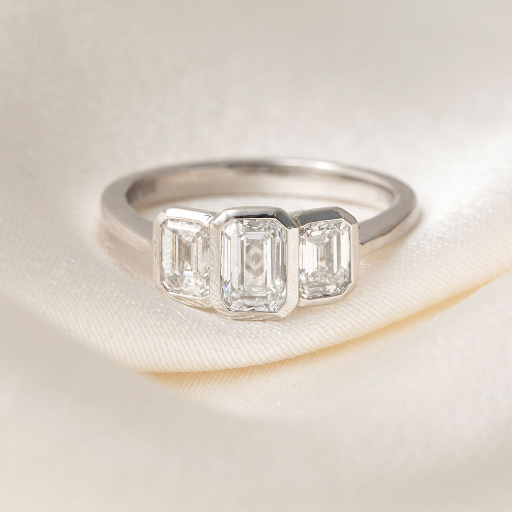 Bezel & Three Stone-1.0 CT Emerald Lab Grown Diamond Engagement Ring