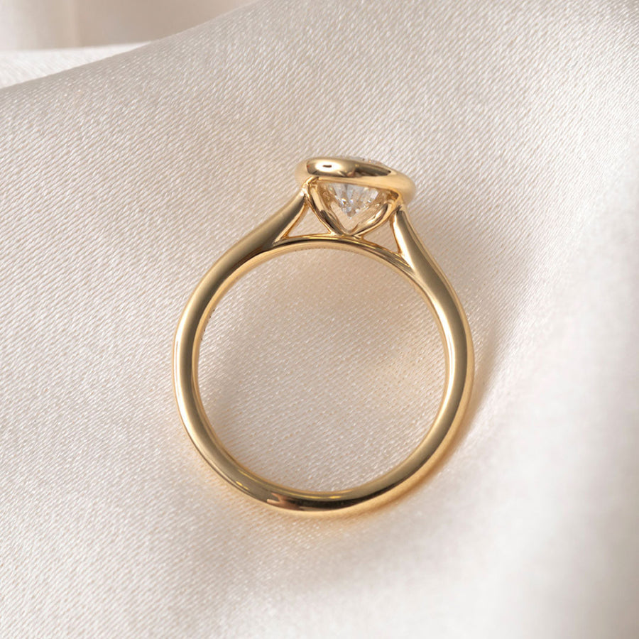 Solitare & Bezel-1.5 CT Pear Lab Grown Diamond Engagement Ring