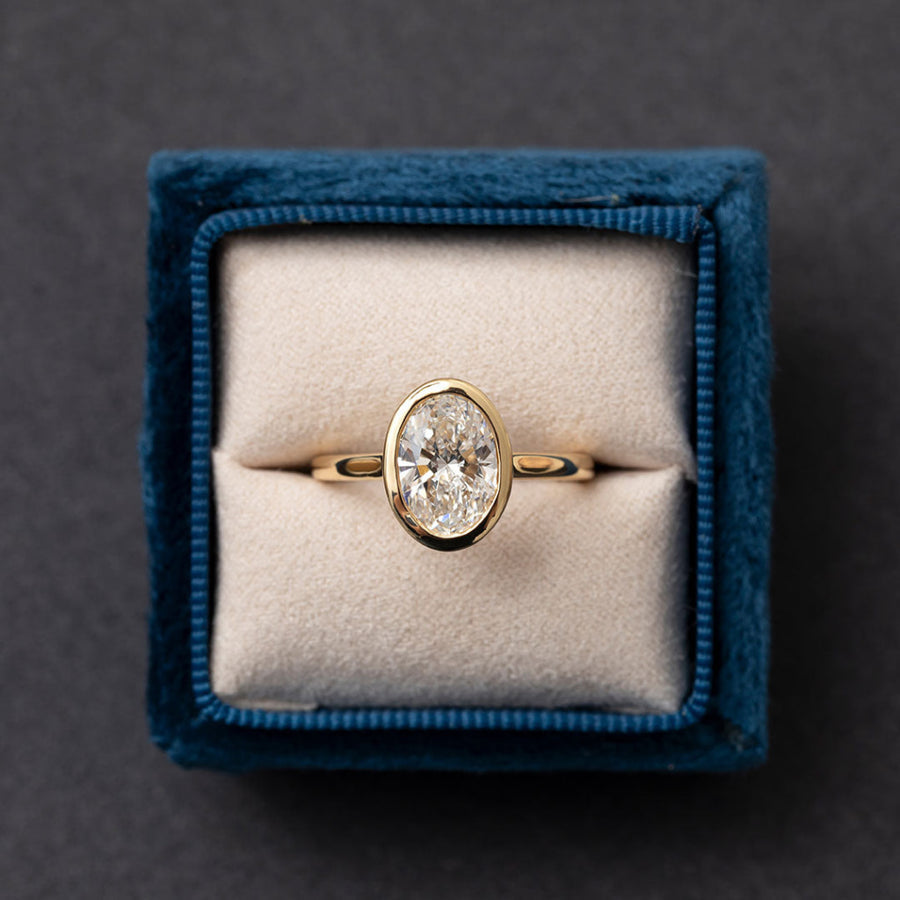 Solitaire & Bezel-2.0 CT Oval Lab Grown Diamond Engagement Ring